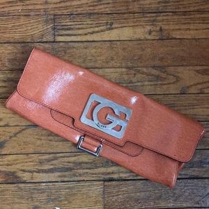 Guess Oversized Clutch in Orange